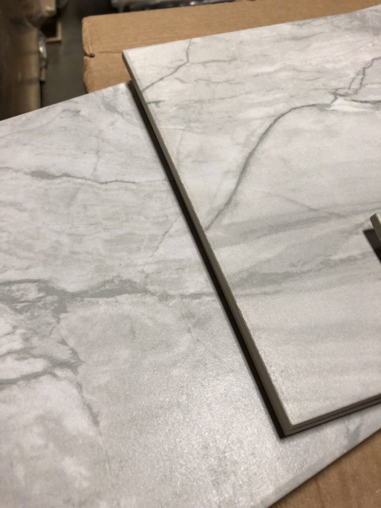 #713 Breccia Mist tile