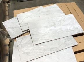 #713 Breccia Mist tile