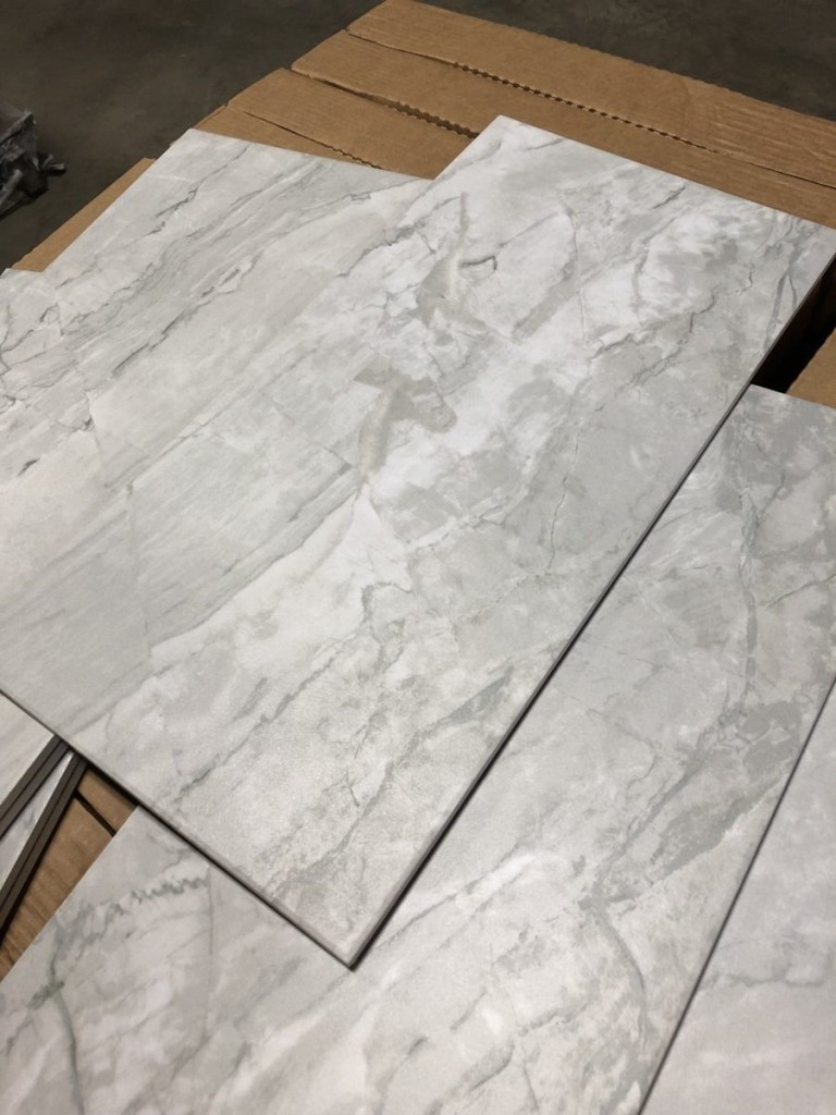 #713 Breccia Mist tile