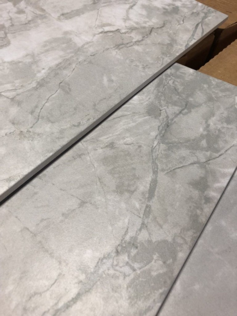 #713 Breccia Mist tile